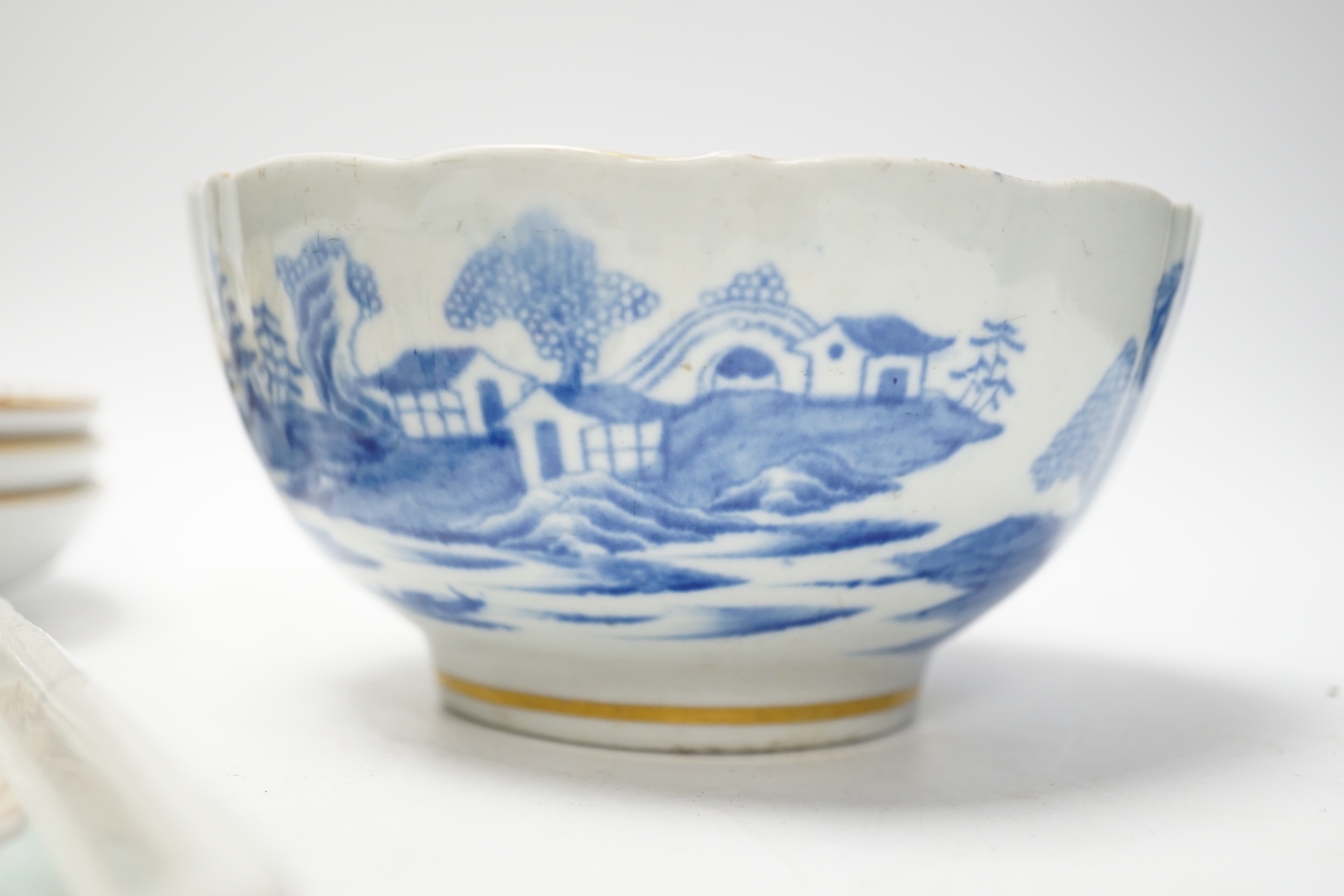 Five items of Chinese tableware; a rectangular tray, three shallow dishes, and a blue and white bowl with gilt decoration, bowl diameter, 14.5cm